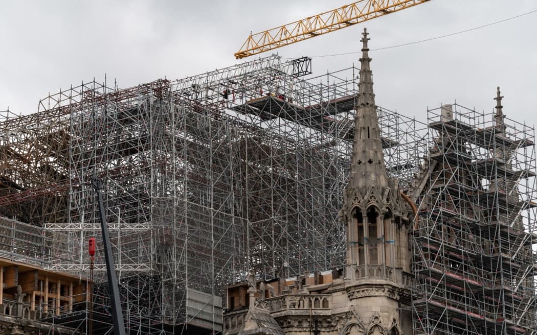 Resumption of work at Notre-Dame de Paris after confinement. Paris, June 14 2020. The repair work had to be stopped because of the coronavirus outbreak.?La reprise des travaux a Notre-Dame de Paris apres le confinement. Paris, 14 juin 2020. Demontage de l'echafaudage de la cathedrale de Notre Dame. Le travail de refection avait du etre arrete en raison de la crise du coronavirus. Echafaudage. Photography by Riccardo Milani / Hans Lucas (Photo by Riccardo Milani / Hans Lucas / Hans Lucas via AFP)