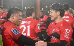 Ioane Moananu and James O'Connor of the Crusaders celebrate.