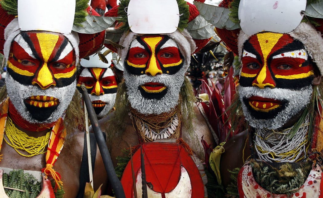 Nebilyer warriors march towards the 50th Goroka singsing (cultural show) in what is believed to be the largest gathering of indigenous tribes in the world in 2006. Over 90 tribes from all over PNG gathered in Goroka.