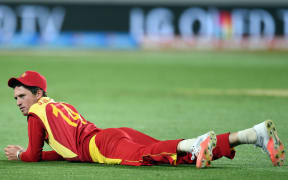 Zimbabwe fielder Sean Williams ruing the mistake of his misfield at gully during the ICC Cricket World Cup match between India and Zimbabwe at Eden Park in Auckland, New Zealand. Saturday 14 March 2015. Copyright Photo: Raghavan Venugopal / www.photosport.co.nz