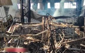 A handout picture released by the Russian Investigative Committee on 29 July 2022 shows what is said is the destroyed detention centre in the settlement of Olenivka in the separatist-held region of Donetsk. - Russia and Moscow-backed separatists accused Kyiv's forces of striking a jail holding Ukrainian prisoners of war in eastern Ukraine, saying dozens of people died and scores were wounded. Kyiv denied its forces had struck a prison holding Ukrainian prisoners of war.
