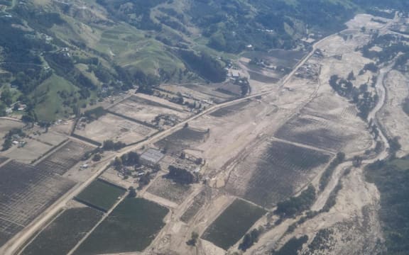 The aftermath of massive flooding that swept through the Esk Valley during Cyclone Gabrielle. The river's normal path can be seen running down the right of the valley.
