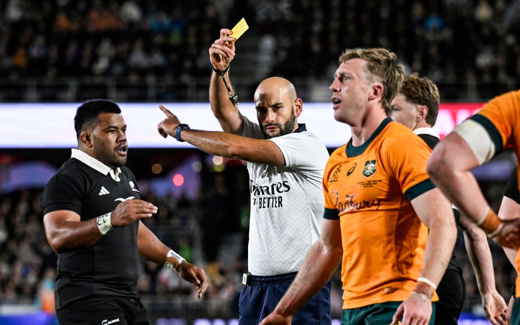 Match referee Andrea Piardi shows a yellow card to Harry Potter of the Wallabies, 2025.
