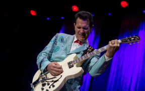 US singer and musician Chris Isaak performs during the Noches del Botanico festival in Madrid on June 22, 2023. (Photo by PIERRE-PHILIPPE MARCOU / AFP)