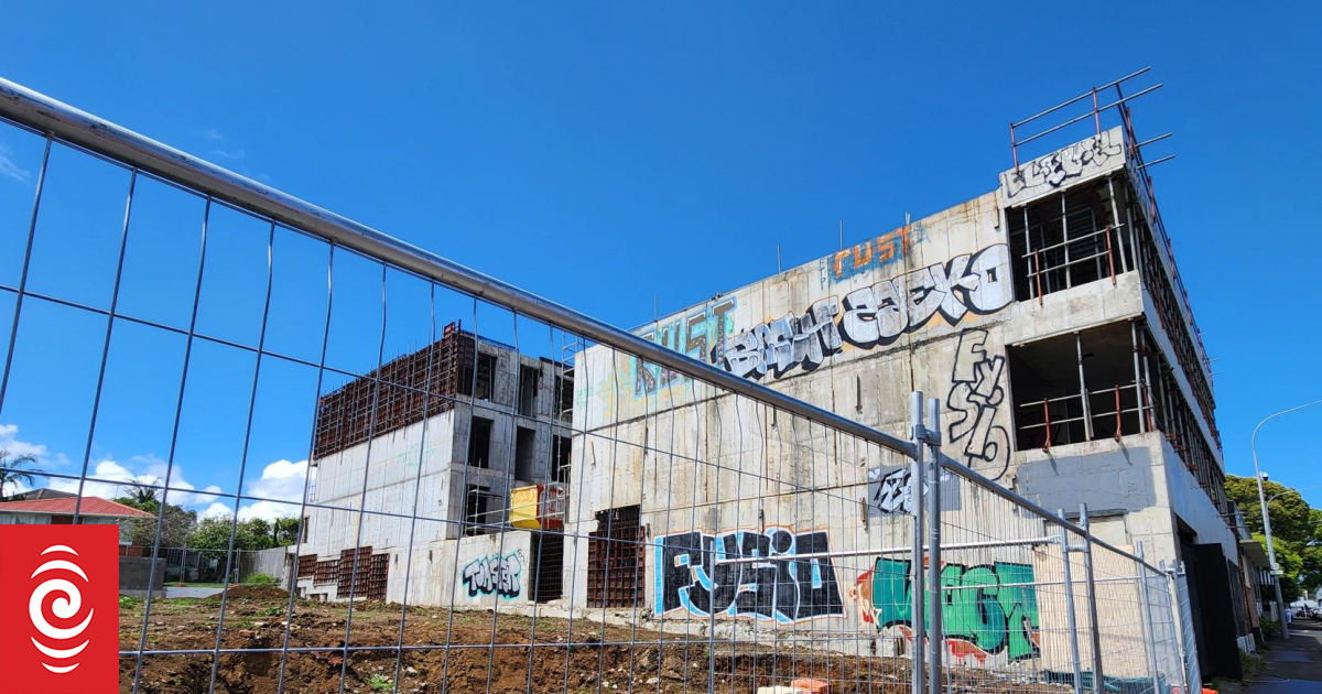 Neighbour wins $30k payout over half-done, 'blight' of an apartment block in Auckland