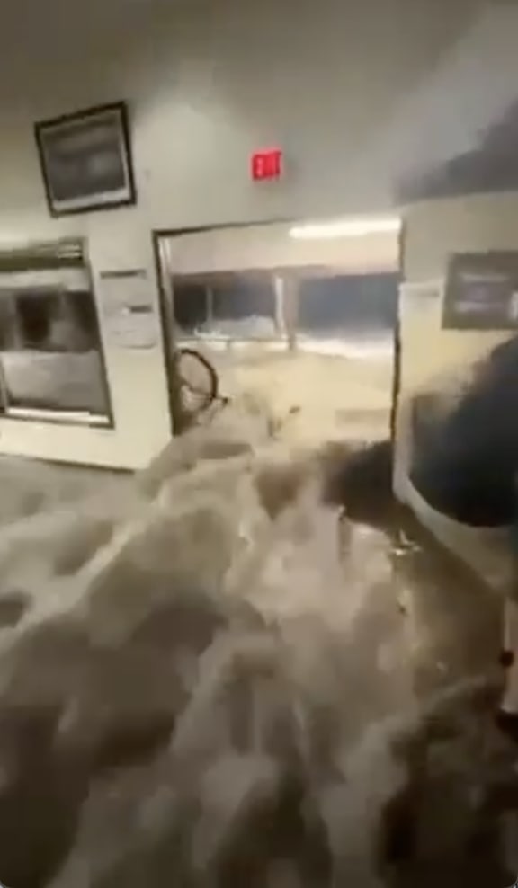 Roi-Namur wave video Screenshot doors gone, water rushing in 1-20-2024 Screenshot 443