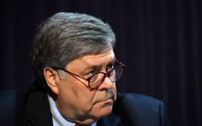 US Attorney General William Barr looks on during a roundtable with US President Donald Trump,faith leaders and small business owners at Gateway Church Dallas Campus in Dallas, Texas, on June 11, 2020.