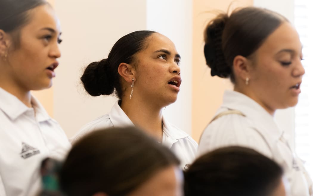 Members of a Tauranga Kura sing in support of a petitioner to Parliament.