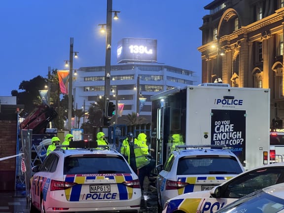 Police in central Auckland the day after the construction site shootings.