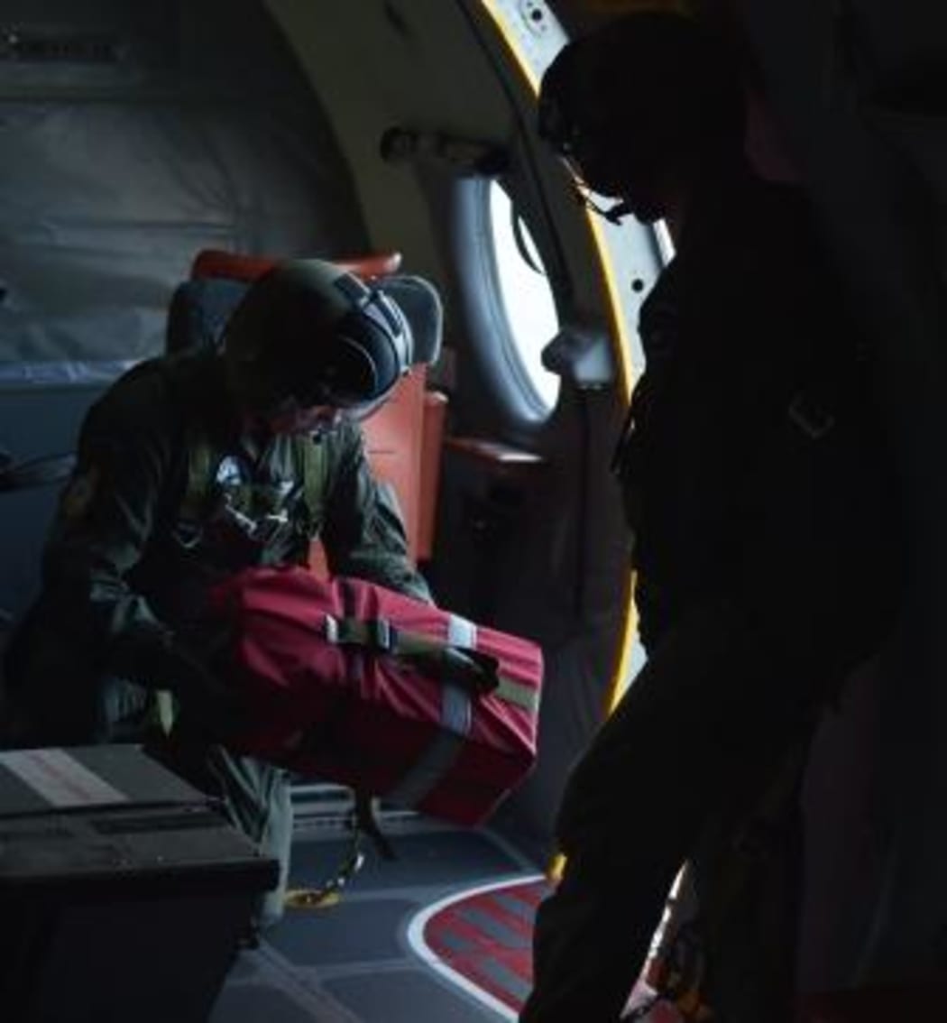 Aid dropped off to survivors found on missing Kiribati ferry.