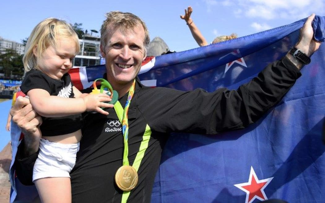 Mahe Drysdale and his daughter Bronte after his Olympic win.