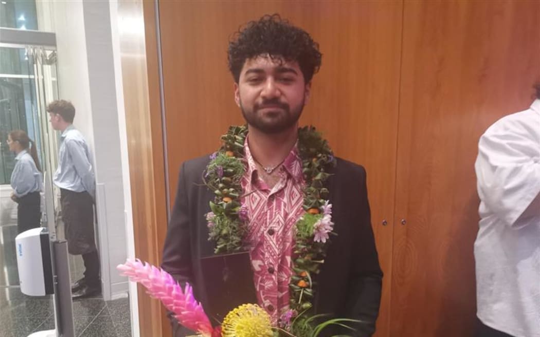 Violinist Hayden Afele-Nickel poses with award at 2023 Arts Pasifika Awards