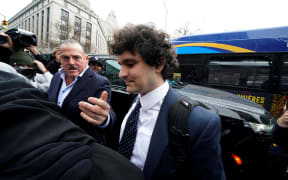 Former FTX chief executive Sam Bankman-Fried (C) arrives to enter a plea before US District Judge Lewis Kaplan in the Manhattan federal court in New York, on January 3, 2023. A US federal judge on August 11, 2023 ordered FTX founder Sam Bankman-Fried back to prison after prosecutors argued he had violated the conditions of his bail and tampered with witnesses. US District Judge Lewis Kaplan directed the disgraced former cryptocurrency highflyer, who had been confined to his parent's California home, back into federal custody.