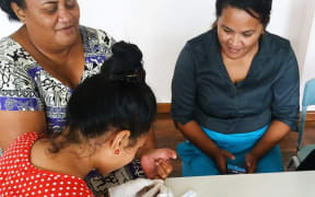 Health workers take part in a training session on the test kit in Tuvalu, May 2018.