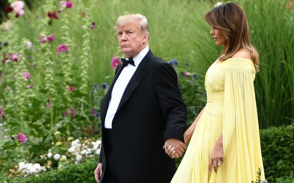 US President Donald Trump and First Lady Melania Trump leave the US ambassador's residence in London, heading to Blenheim Palace for a dinner on the first day of a UK visit.