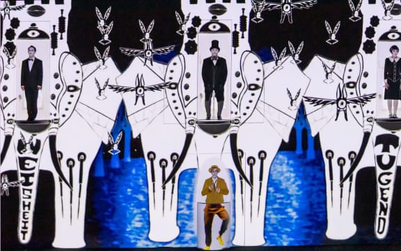 The main characters in The Magic Flute by Komische Oper Berlin are portrayed as actors in a  silent film.