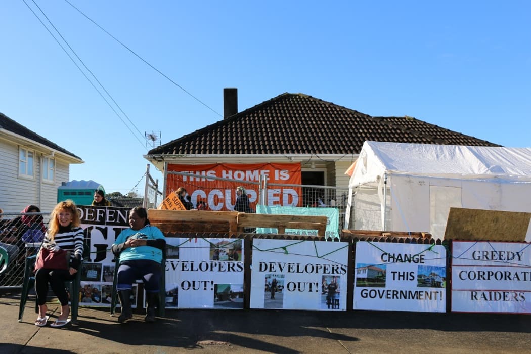 Protesters outside Niki Rauti's home.
