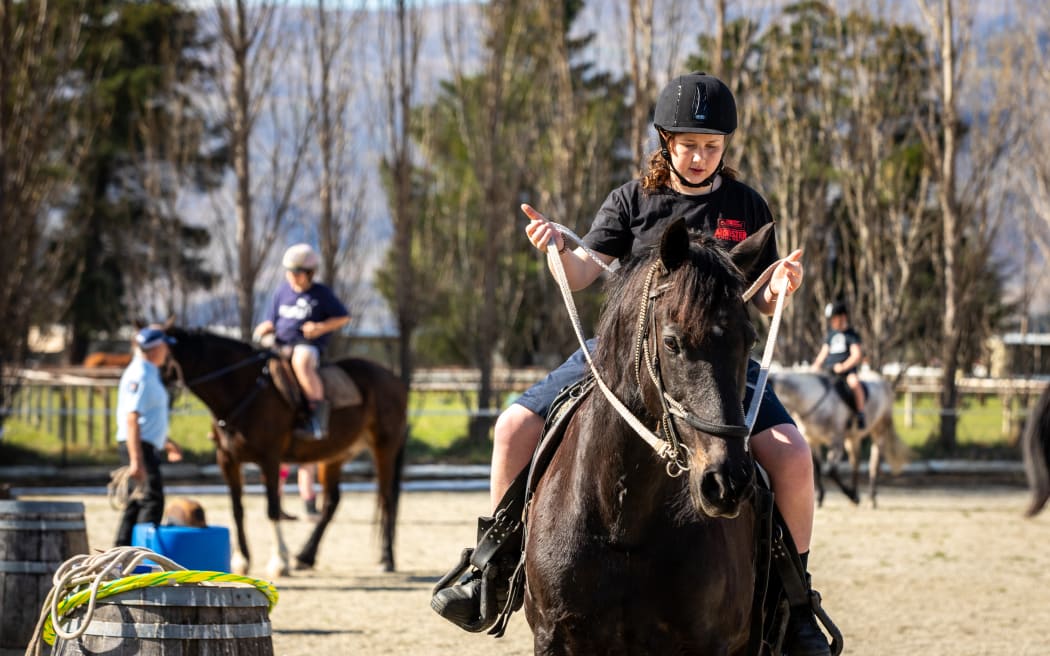 Constable Paddy Henderson puts kids through their paces during the Grab the Reins programme in Central Otago