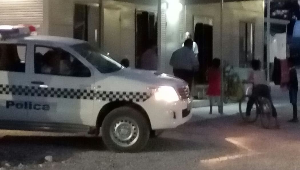 Nauruan police attend a protest by children at the offshore processing centre.