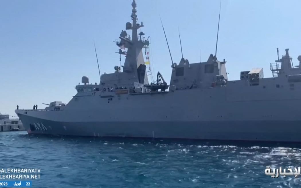 This grab taken from a video footage provided by Saudi Arabia's official Al-Ikhbaryia TV channel on April 22, 2023 and made available via AFPTV, shows a boat used in the evacuation of Saudi citizens and other nationals from Sudan, moored in Jeddah. A ship carrying Saudi citizens and other nationals rescued from battle-scarred Sudan arrived in Jeddah, Saudi television said, in the first announced evacuation of civilians since fighting began.