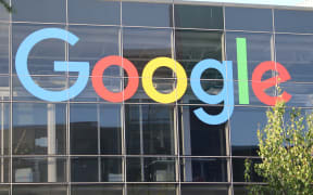 The logo of Google on the facade of headquarter of the parent company Alphabet.
