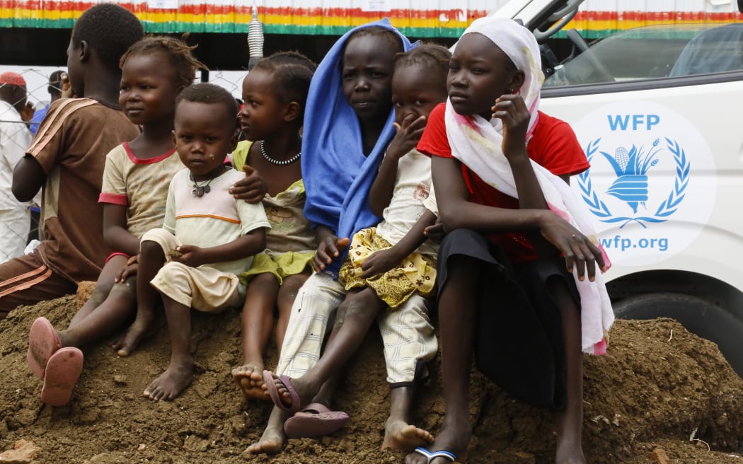 Displaced children sit at a camp near Kadugli, the capital of Sudan's South Kordofan state