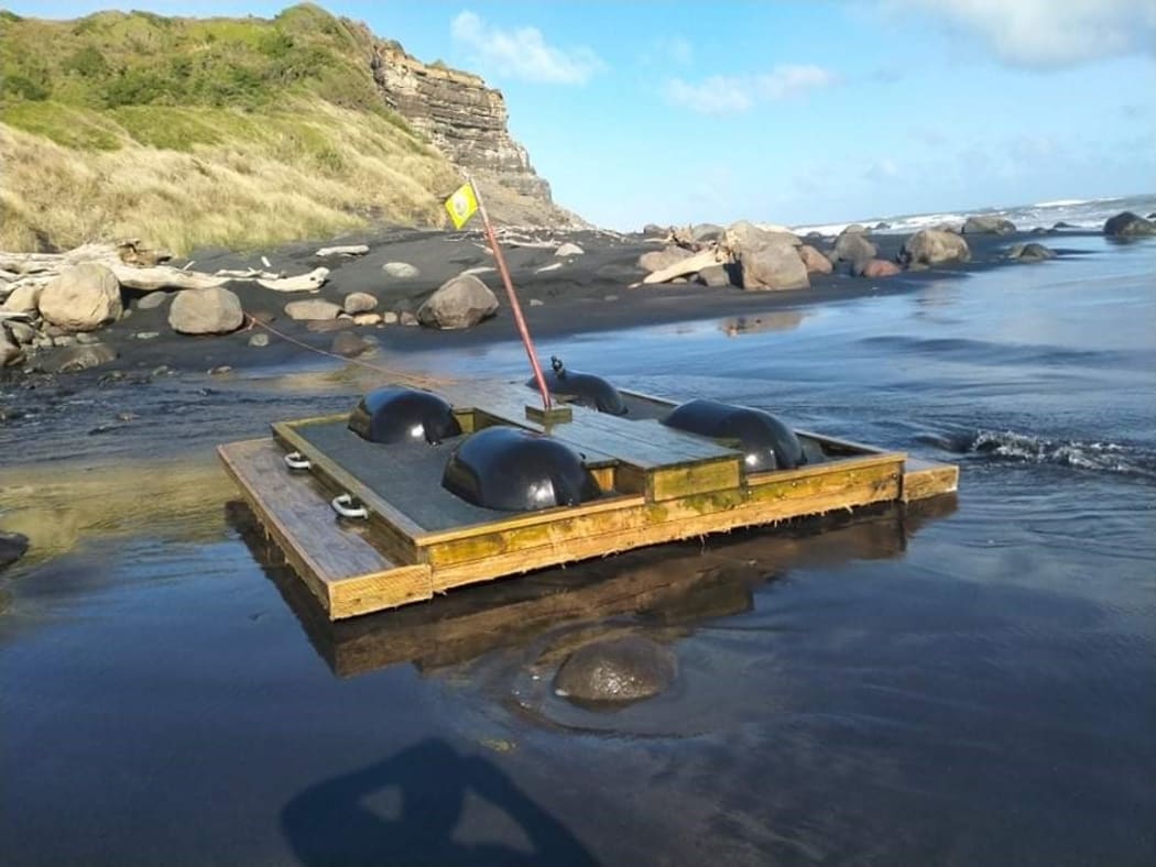 The pontoon from Quinney's Bush Camp, south of Nelson, washed up the Motupiko River and floated up the sea to South Taranaki