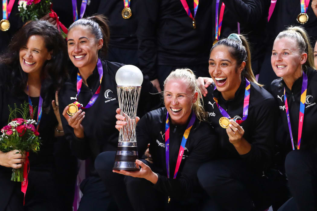 Laura Langman holding the World Championship trophy.