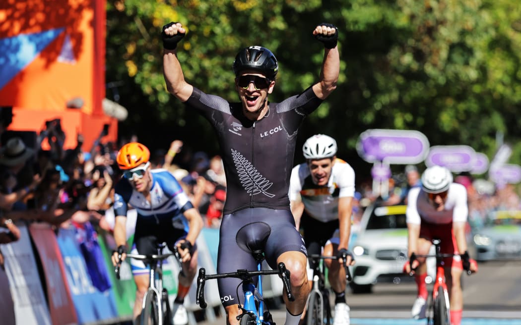 New Zealand cyclist Aaron Gate wins the men's road race at the Birmingham Commonwealth Games.