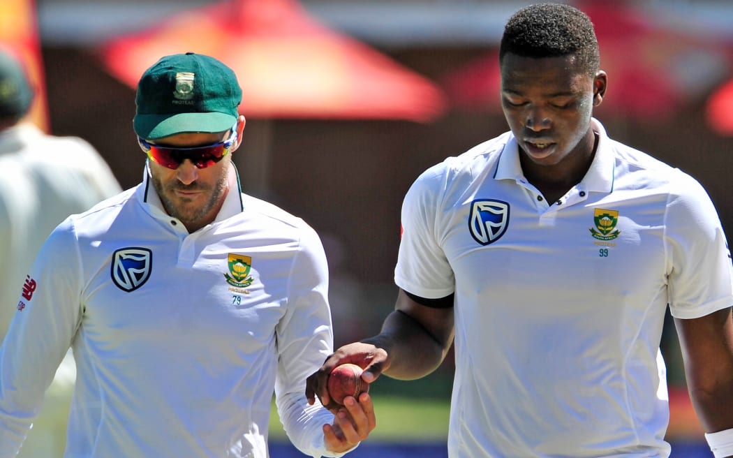 South African captain Faf du Plessis, right, and fast bowler Kagiso Rabada.