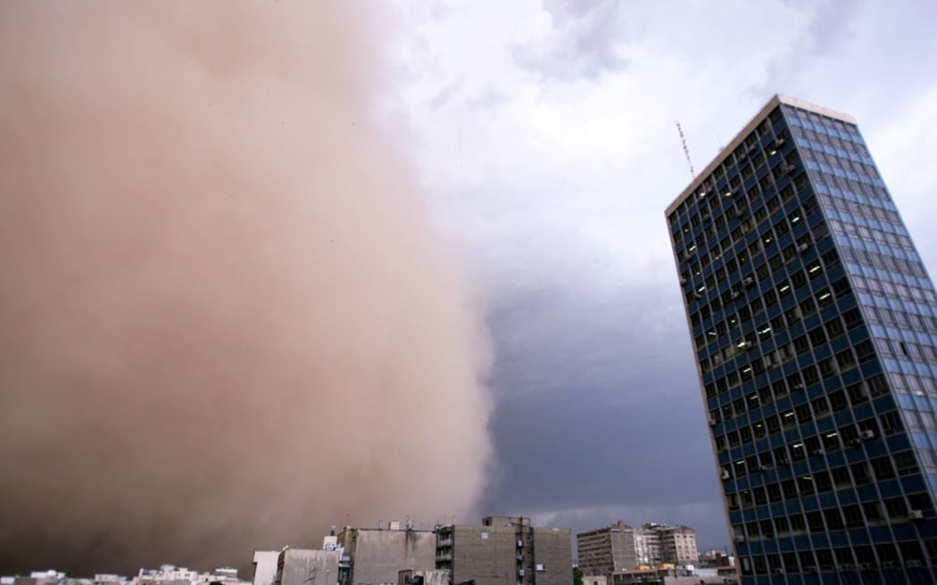 The sandstorm killed at least four people, damaged buildings and knocked out power supplies.
