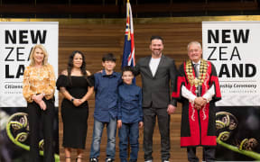 Max Siqueira (second from right), during his New Zealand citizenship ceremony - he has now moved to Australia.