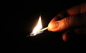 Burning match