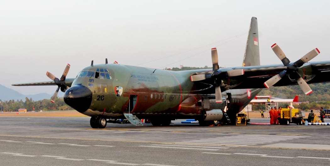 An Indonesian Air Force C-130 on the at Langkawi International Airport flightline.