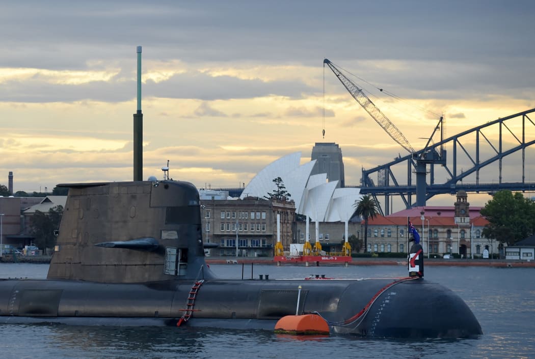 In this photo taken on October 12, 2016, a Royal Australian Navy diesel and electric-powered Collins Class submarine sits in Sydney Harbour.
