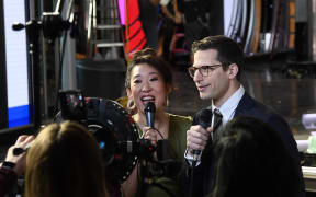 Sandra Oh and Andy Samberg, hosts of the 76th Annual Golden Globe Awards, are interviewed by the media in front of the main stage during a preview day at The Beverly Hilton Hotel on January 3, 2019 in Beverly Hills, California.