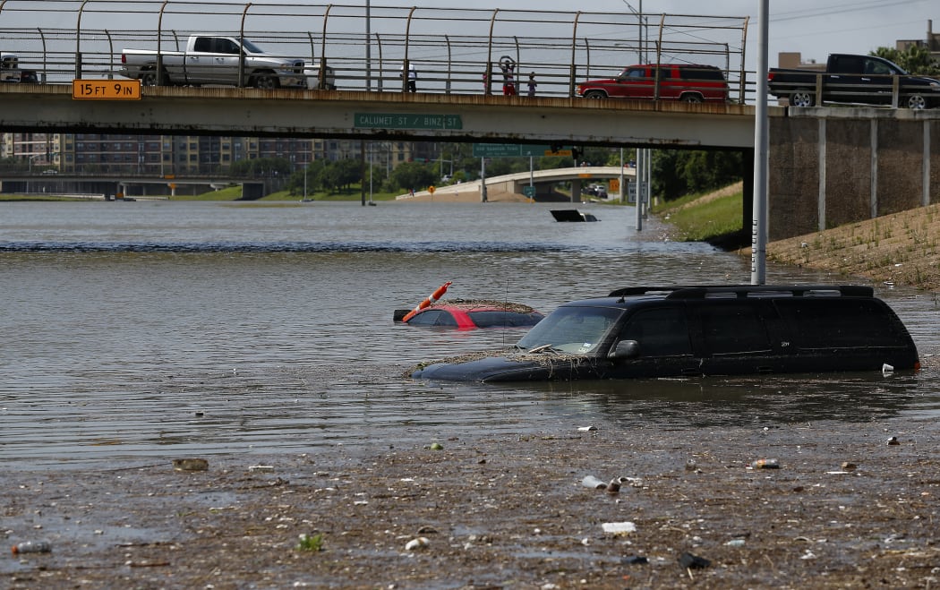 Vehicles left stranded on Texas State Highway 288 in Houston on 26 May.