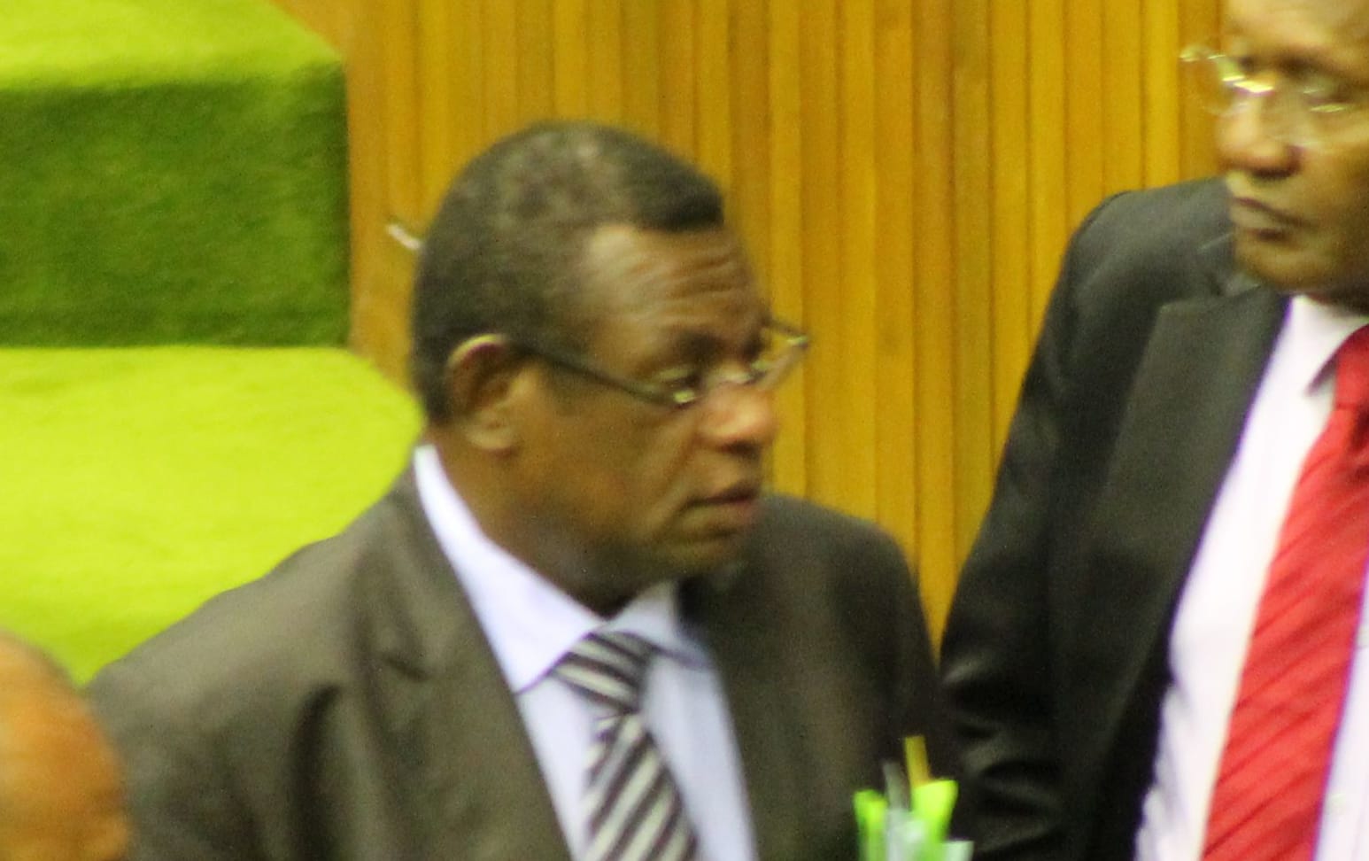 Members of the Papua New Guinea government, including Treasurer Patrick Pruaitch (centre) and Prime Minister Peter O'Neill (right)