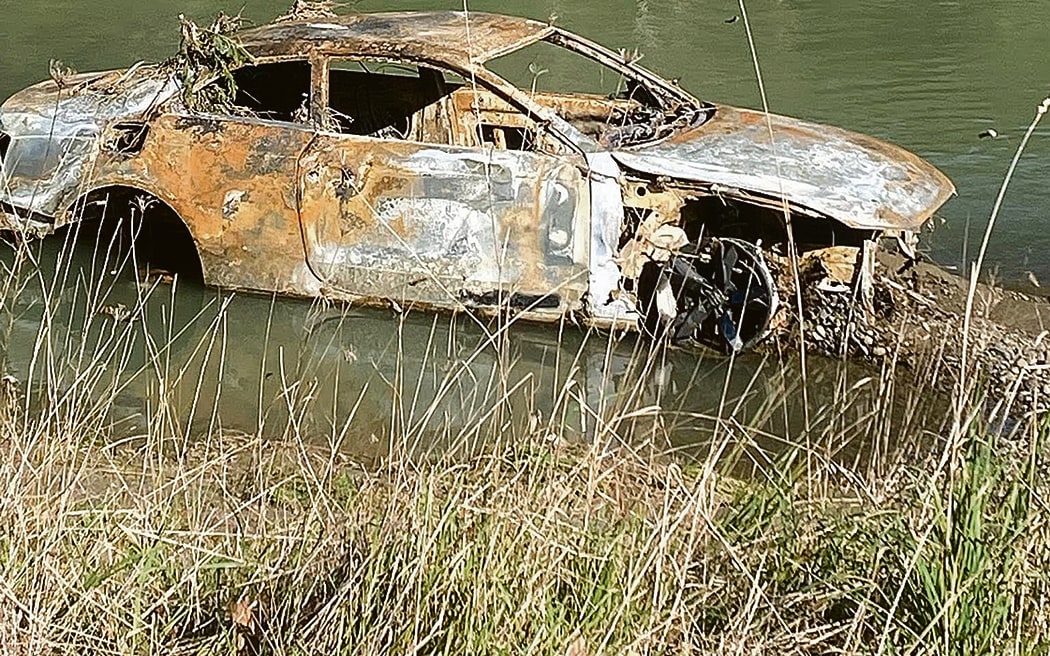A two-door coupe style vehicle was found in the Tauranga River at Wardlaw Glade