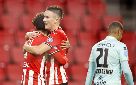 Ryan Thomas celebrates with American midfielder Richard Ledezma after scoring PSV Eindhoven's third goal in their 4-0 win over ADO Den Haag in the Dutch Eredivisie on November 1, 2020.