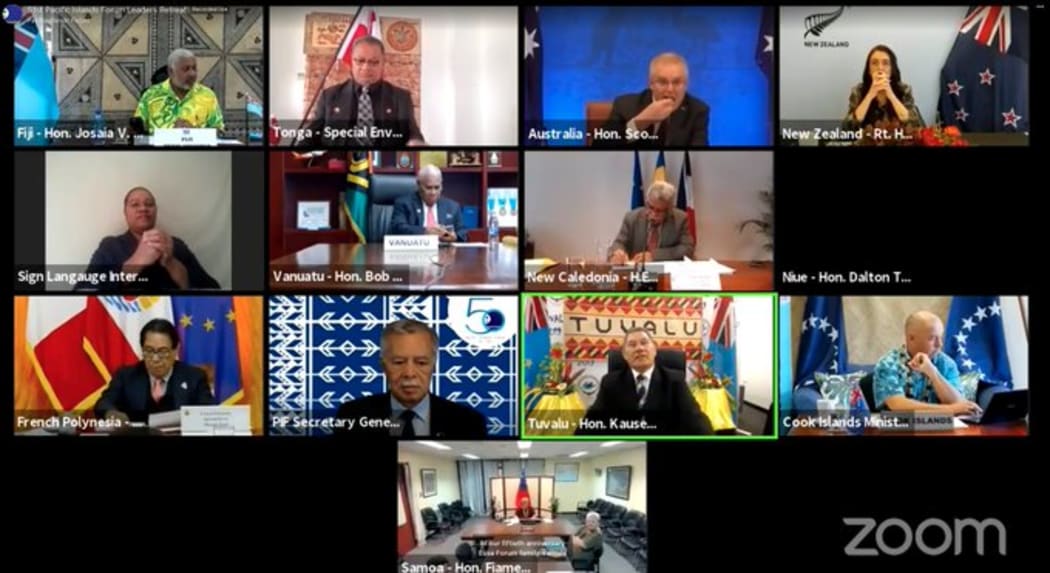 Australia's Prime Minister Scott Morrison wolfs down some food during a Pacific Islands Forum leaders virtual summit, 6 August 2021/