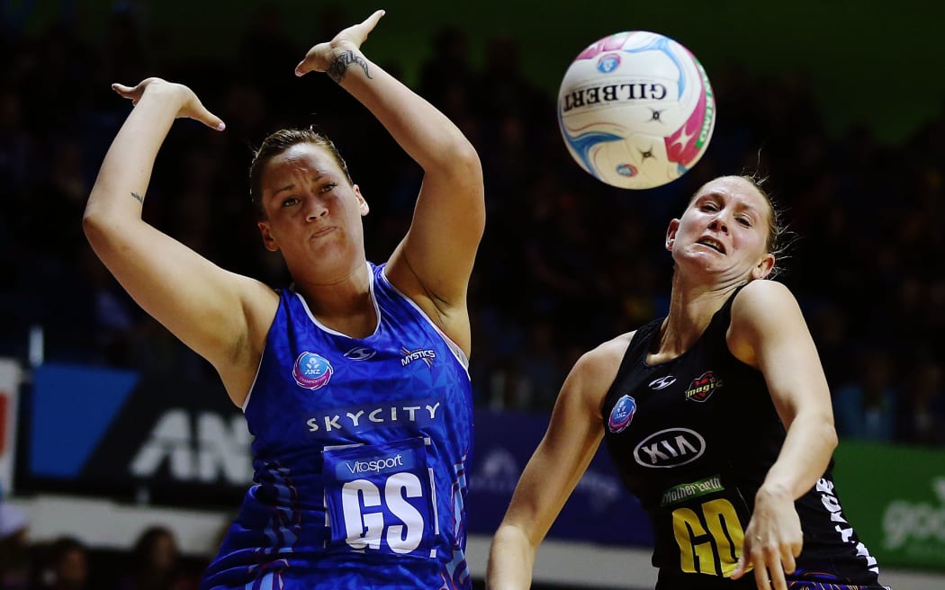 Cathrine Tuivaiti (nee Latu) battles for possesion with former WKBOP Magic defender Casey Kopua.