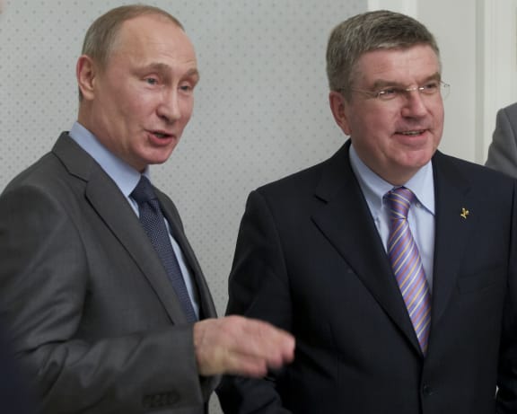 IOC president Thomas Bach, right, with Russian leader Vladimir Putin.
