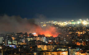 Fire rises from the site of an Israeli airstrike in the southern suburbs of Beirut early on March 6, 2026. Heavy attacks were reported in Tehran on March 6 after Israel said it was hitting "regime infrastructure" in a "new phase" of the war it launched with the United States against Iran. As the conflict entered its seventh day, its regional repercussions continued -- with Qatar saying it intercepted a drone targeting a US base, and Lebanon reporting the death toll from Israeli strikes had risen to 123. (Photo by FADEL itani / AFP)