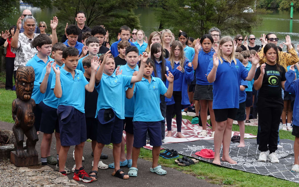 Children from Kerikeri Primary School and Bay of Islands International Academy perform a haka pōwhiri.