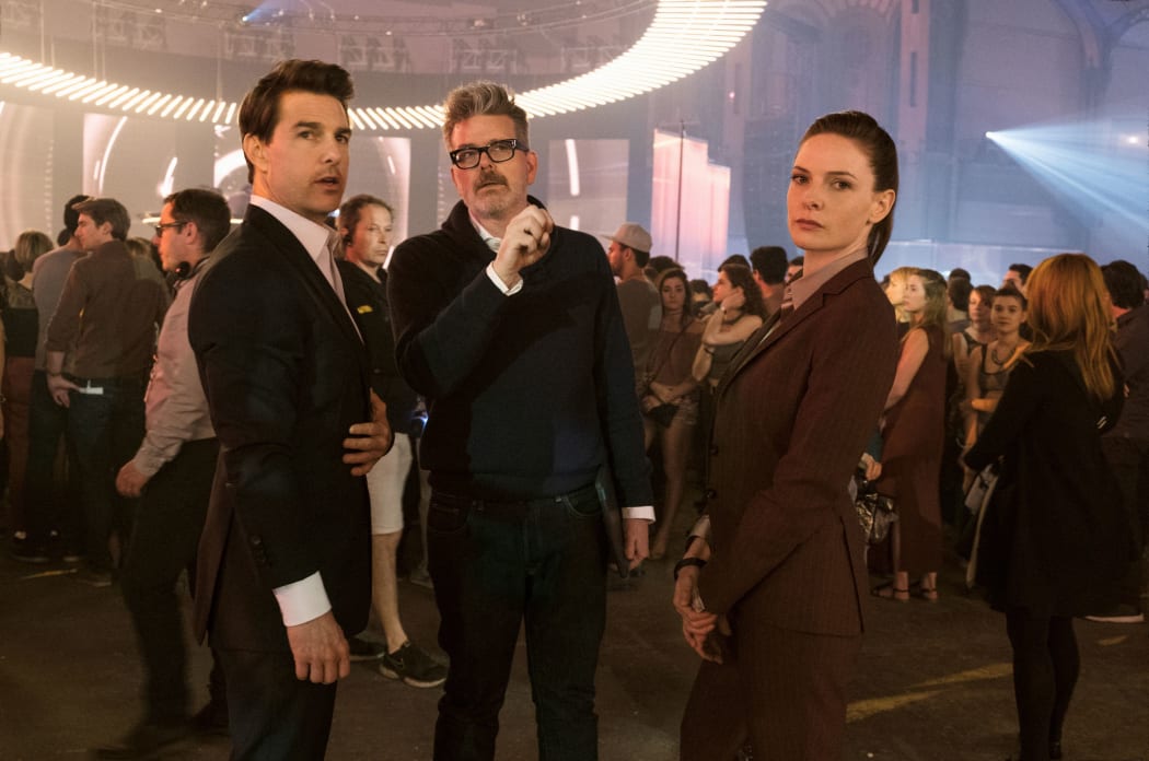 Producer/Star Tom Cruise, director Christopher McQuarrie and co-star Rebecca Ferguson working on a scene in Mission: Impossible - Fallout.