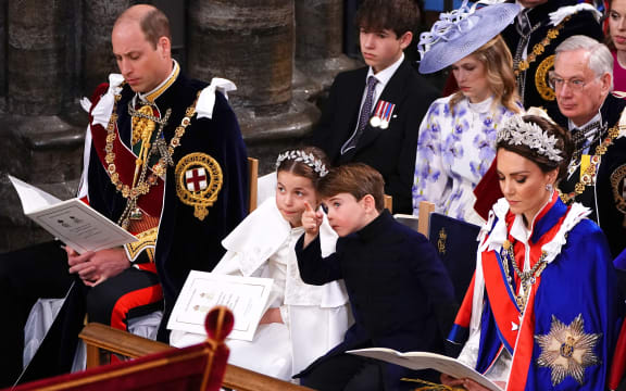 (From left) Prince William, Prince of Wales, Princess Charlotte, Prince Louis and Catherine, Princess of Wales attend the coronation of King Charles III and Camilla, Queen Consort at Westminster Abbey in central London on May 6, 2023. - The set-piece coronation is the first in Britain in 70 years, and only the second in history to be televised. Charles will be the 40th reigning monarch to be crowned at the central London church since King William I in 1066. Outside the UK, he is also king of 14 other Commonwealth countries, including Australia, Canada and New Zealand. Camilla, his second wife, will be crowned queen alongside him, and be known as Queen Camilla after the ceremony. (Photo by Yui Mok / POOL / AFP)