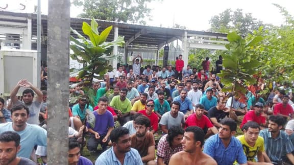 A handout photo from Refugee Action Coalition taken and received on 13 November 13 shows refugees at the Australian detention centre on Manus Island.