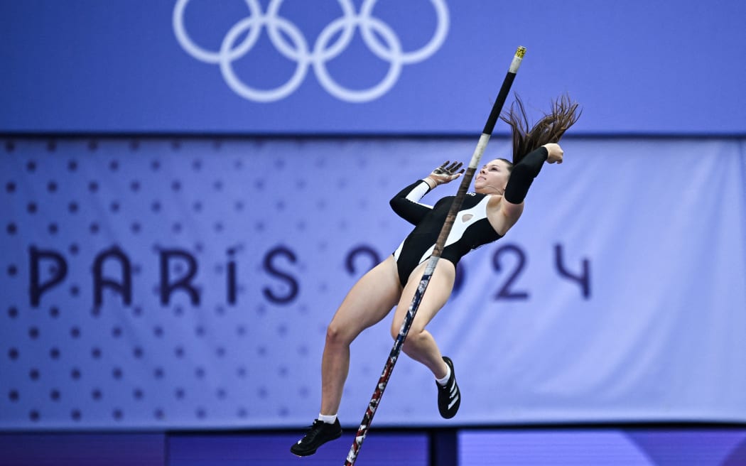 New Zealand's Olivia McTaggart competes in the women's pole vault qualification of the athletics event at the Paris 2024 Olympic Games at Stade de France in Saint-Denis, north of Paris, on August 5, 2024. (Photo by Ben STANSALL / AFP)