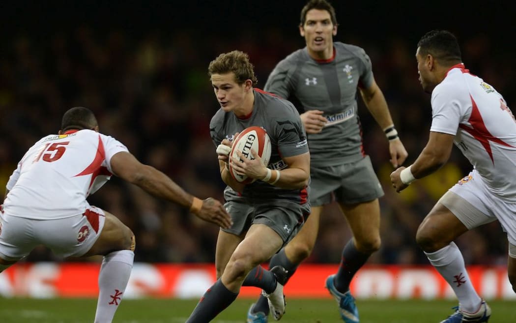 Hallam Amos of Wales takes on Vunga Lilo of Tonga. (2013)